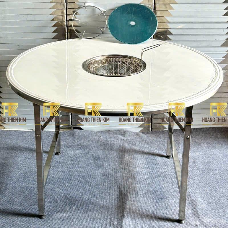 Bàn tròn inox có khoét lỗ lò nướng